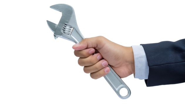 a hand firmly grasping an adjustable wrench, symbolizing problem-solving and technical skills