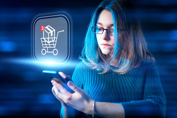 Business woman doing e-commerce. Basket with box symbolizes internet retail. Girl makes online purchases. Electronic retail symbol near businesswoman. Woman does online shopping through smartphone.