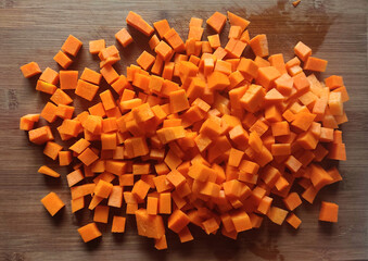 diced pumpkin on wooden desk