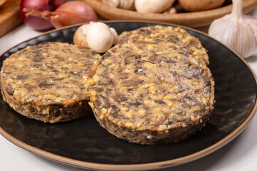 Tasty organic vegetarian food, burgers with champignons mushrooms, cheese and onion