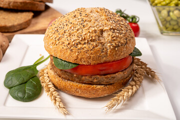 Make burger buns with vegan or vegetarian patties or burgers made from grains, vital wheat gluten food, grilled healthy food