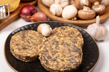 Tasty organic vegetarian food, burgers with champignons mushrooms, cheese and onion