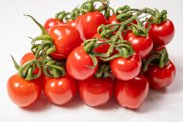 ed sweet ripe tasty Dutch tomatoes growing indoor in greenhouse all seasons, food industry in Netherlands close up
