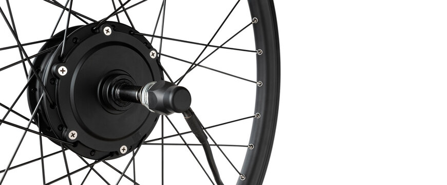 Rear motor-wheel of a bicycle, an electric motor spoked into a bicycle rim. Electric bicycle repair. close-up, cut out, with copy space. - Powered by Adobe
