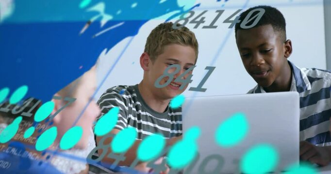 In school, boys using laptop with animation of numbers and dots overlaying