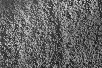 gray background, photo shows texture of plaster of concrete wall of building