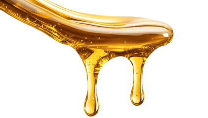 Dripping golden oil isolated on white background