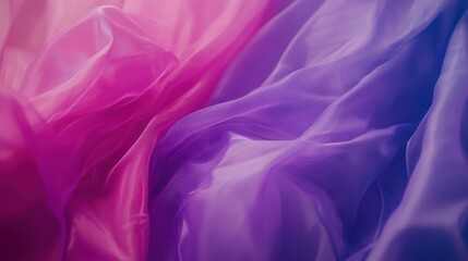 Obraz premium A close-up of flowing silk fabric in shades of pink and purple.