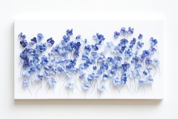 A delicate artwork featuring numerous blue silk flowers artfully arranged on a white canvas, creating a serene and elegant floral display.