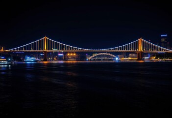 Obraz premium City harbor bridge illuminated at night, reflecting lights in dark water, night, illumination