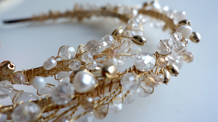 Close up photo of a crystal and pearl jewelry