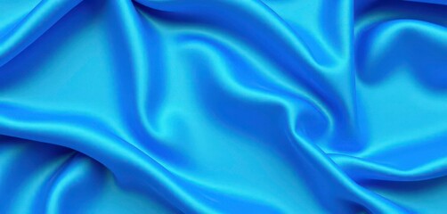 Obraz premium Smooth, shiny blue fabric with a wavy pattern, bright, background