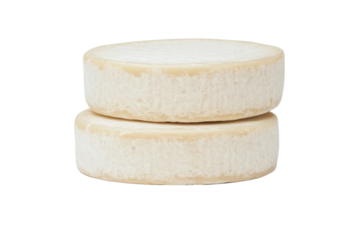 Two stacked brie cheese wheels on white background, cut out