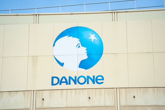 Zoetermeer, Netherlands - March 21, 2025: Logo and name of French multinational food products corporation Danone on a factory.
