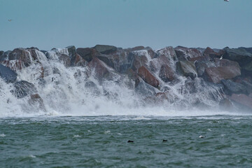 Powerful Sea Waves Breaking on Coastal Rocks