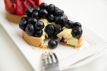 Close up of French Blackberry and Strawberry Tarts