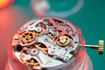 Intricate details of wristwatch mechanism reveal artistry in mechanical engineering and...