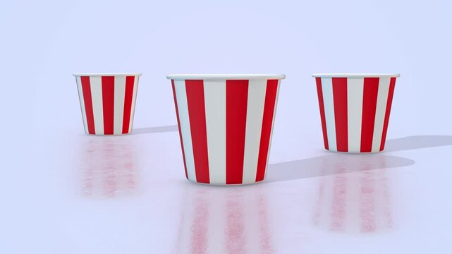Popcorn Buckets on a Light Reflective Floor. Popcorn Boxes 3D Animation. 4K