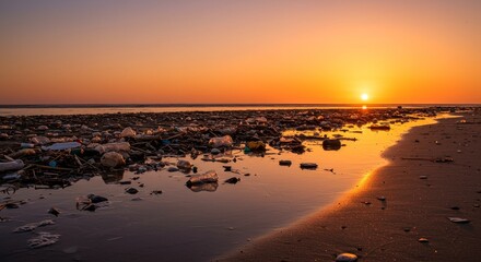 Sunset Over Polluted Shore - Plastic debris litters a beach at sunset, highlighting the environmental impact of pollution. Ocean pollution, waste, and environmental damage are depicted