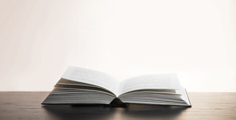 Open book on white background
