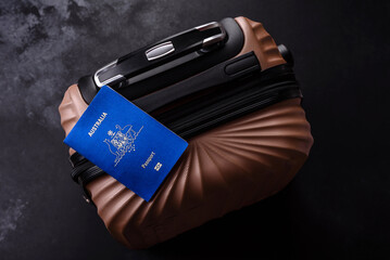 International passport of a citizen of Australia on a suitcase © chernikovatv