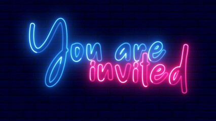 You are invited neon sign. You are invited text font with neon light. Luminous and shimmering haze inside the letters of the text You are invited. 