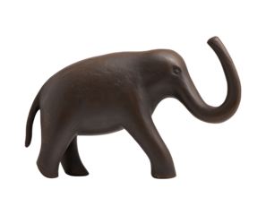 An antique style elephant sculpture side view, isolated against a transparent background