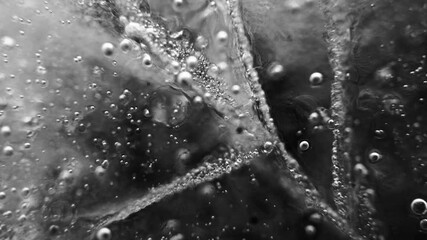 Close up shot of an ice surface with cracks and frozen air bubbles - Powered by Adobe