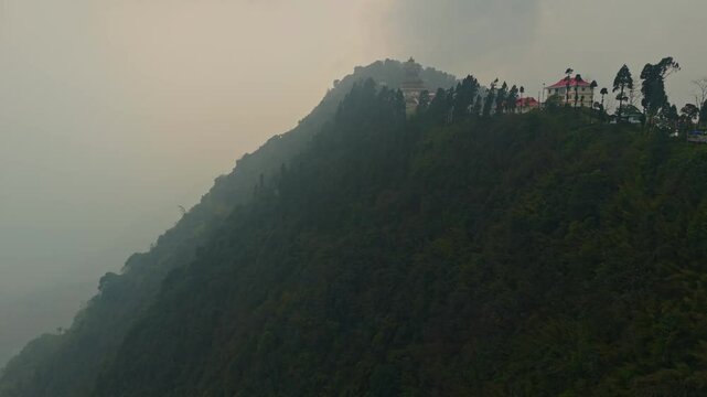 Aerial, drone shot 4k. Aerial view of the foggy day in Pelling, Sikkim. Sikkim mountains. Northern India. Indian Mountain. D Log Footage. Bird eye View. Travelling Northeast. Big mountain. Video