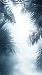 Palm fronds create a calming frame with a dreamy bokeh backdrop, inviting serenity and tropical vibes, bathed in a serene blue hue.