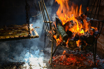 Rustic barbecue with flames and cozy ambiance for traditional outdoor grilling