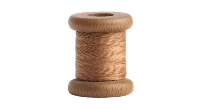 A close-up of a spool of thread reveals the texture and color of the material.  Sewing concept. The intricate wrap of the thread adds depth to this image.