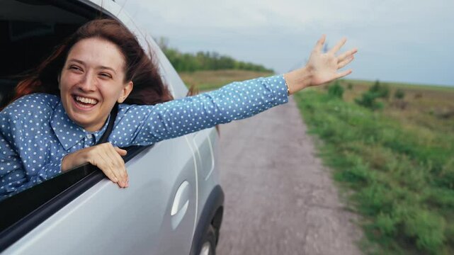 family girl car window, happy face woman smile, catching wind hand, adventure seeker woman, auto journey holidays, enjoying travel view, car laughter journey, van trip leisure, escape route happiness