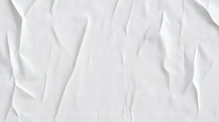 Obraz premium Crumpled white paper texture with subtle gray patterns, ideal for backgrounds or design elements.