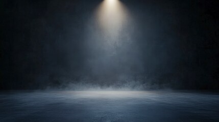 Dark stage with a spotlight illuminating a textured floor, creating a dramatic atmosphere.