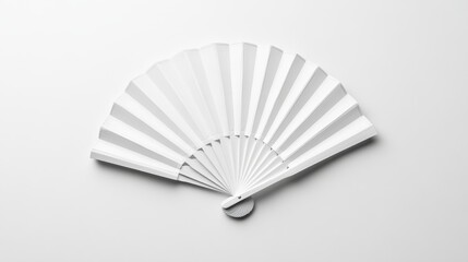 A minimalistic white folding hand fan, elegantly opened and set apart against a clean white background, showcasing its delicate pleats and structure with soft shadows.