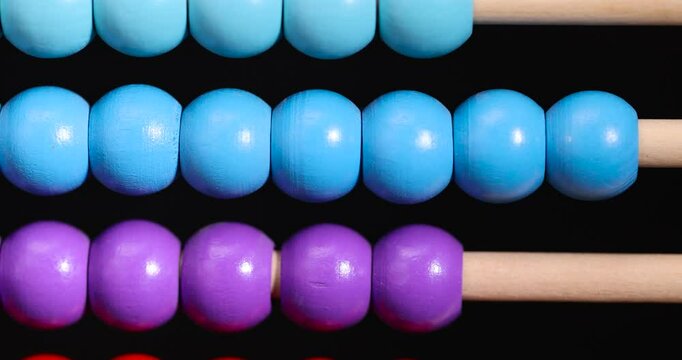 wooden abacus for children's play, wooden children's abacus for learning and development, closeup