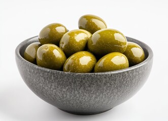 Fresh and Glossy Green Olives in a Textured Bowl Perfect for Culinary and Food Photography with a Minimalist Aesthetic for Stock Use