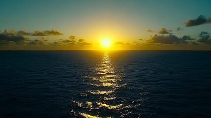 Obraz premium A beautiful sunset over the vast and calm ocean waters