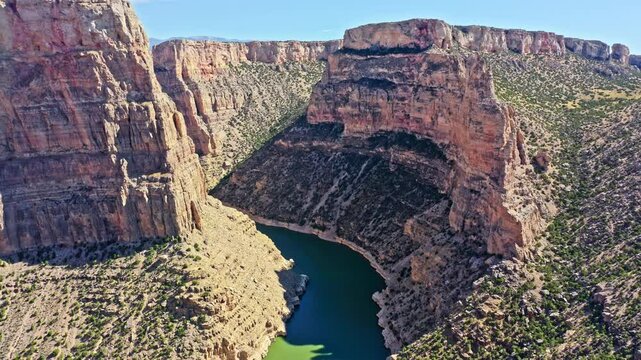 Fly over Big Horn river inside Devils Canyon, Montana. This 1000 foot deep canyon is a rugged, sinuous gorge with numerous short tributary canyons, that offers spectacular views.