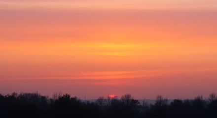 Fototapeta premium Soft, blurred sunset sky background with pastel colors, perfect for serene, calming, and peaceful designs.