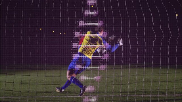 Goalkeeper in yellow jersey saving ball with digital animation overlay on net