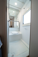 ANKARA,TR-AUGUST 20,2024:Interior with,tables,refrigerator,kitchen corners,ceiling ligthning,couches,living space in modern Adria Alpina 583 LP.