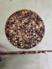 Caramelized Nutty Cookie on Textured Surface