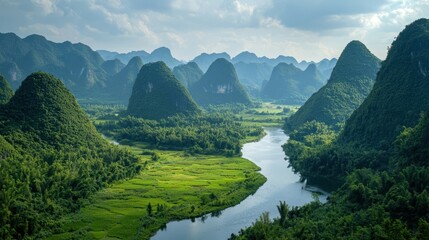 A lush green valley nestled between towering mountains, with a river flowing through