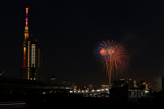 night scenery of sumida river fireworks festival 2023 with tokyo sky tree seen from shioiri park in minami-senju, arakawa city