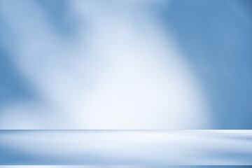 Wall interior background, studio and backdrops show products. with soft light shadow from window color blue and white. background for text insertion and presentation of product	