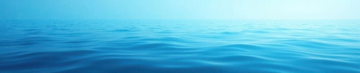 Soft gradient blue background resembling a calm ocean, natural ambiance, gentle waves