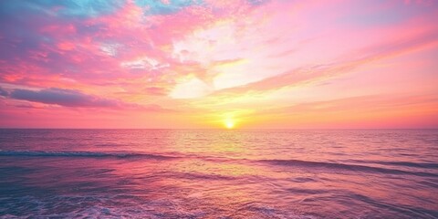 Fototapeta premium A mesmerizing sunset over the ocean with vibrant hues of pink, orange, and purple