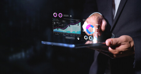 Businessman touch investment growth graph chart and analysing growth achievement diagram data...